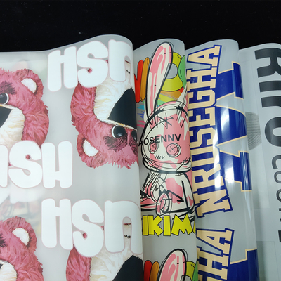 ตัวอย่างฟรี เปลือกร้อน DTF Roll PET Film Print Dtf Film Roll DTF Transfer Film สําหรับการพิมพ์ผ้า